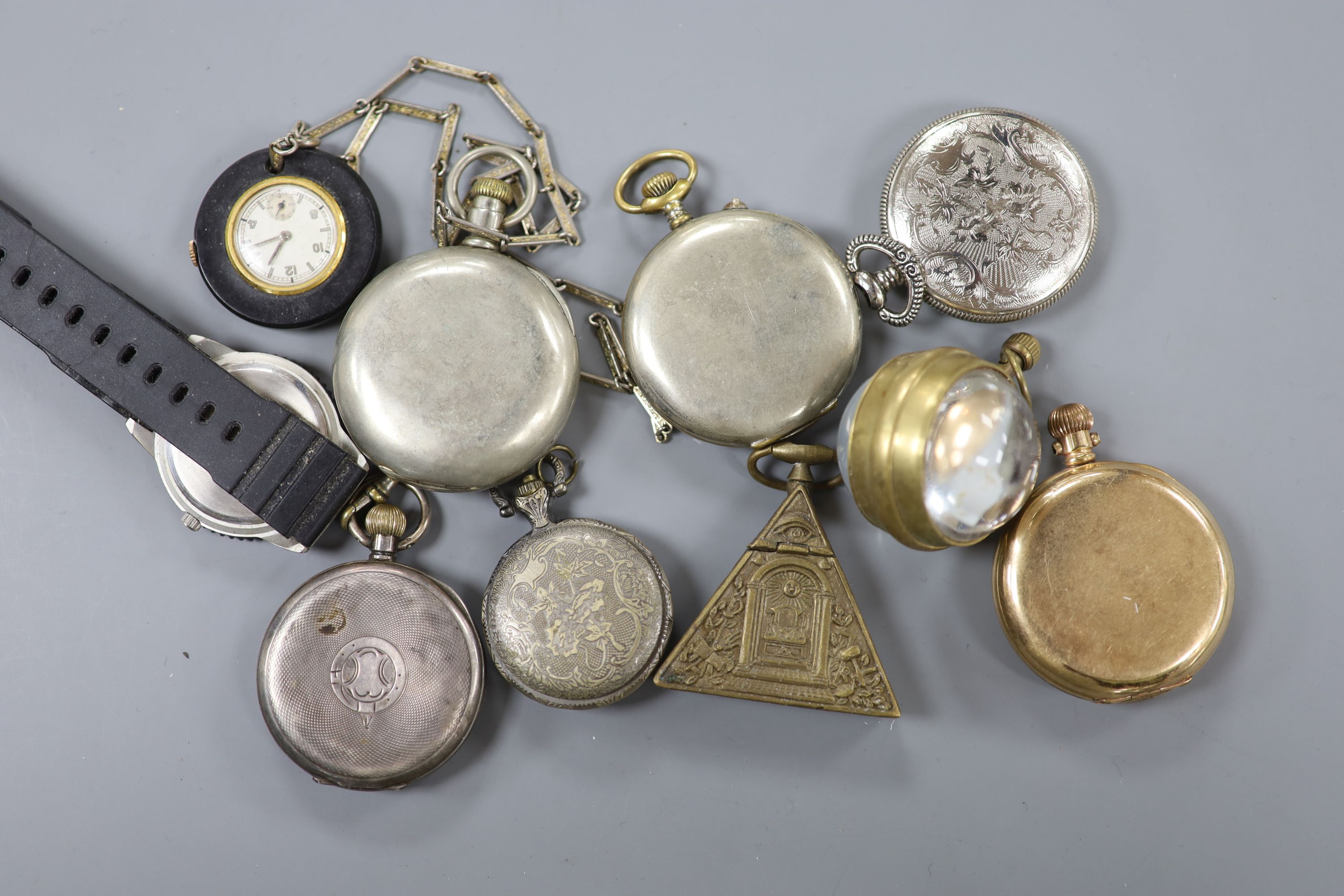 A small group of assorted pocket watches etc including a silver open face pocket watch and a globe watch.